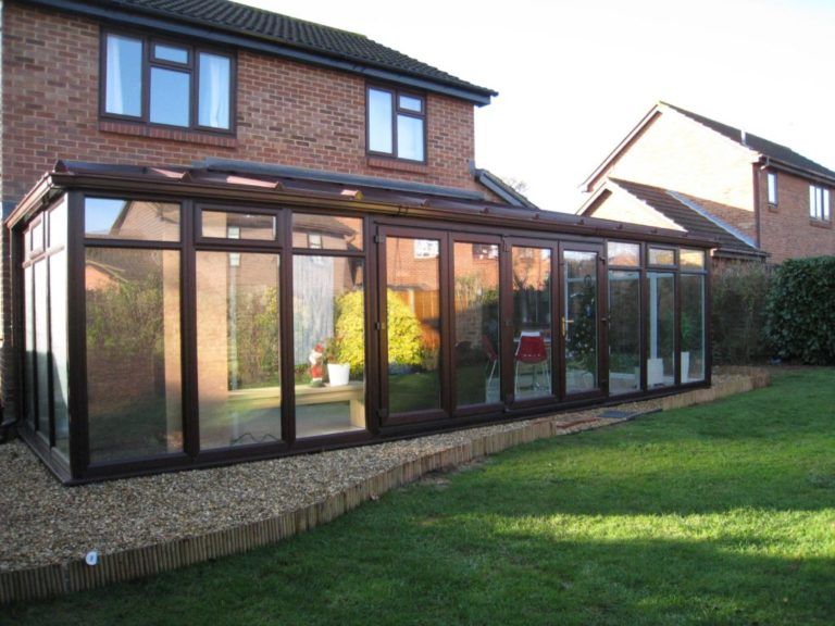 Hipped Lean To Conservatory with Full Height Glass