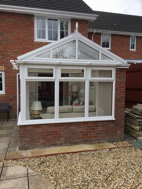 Gable End Conservatory with full height privacy wall - Gwilliam