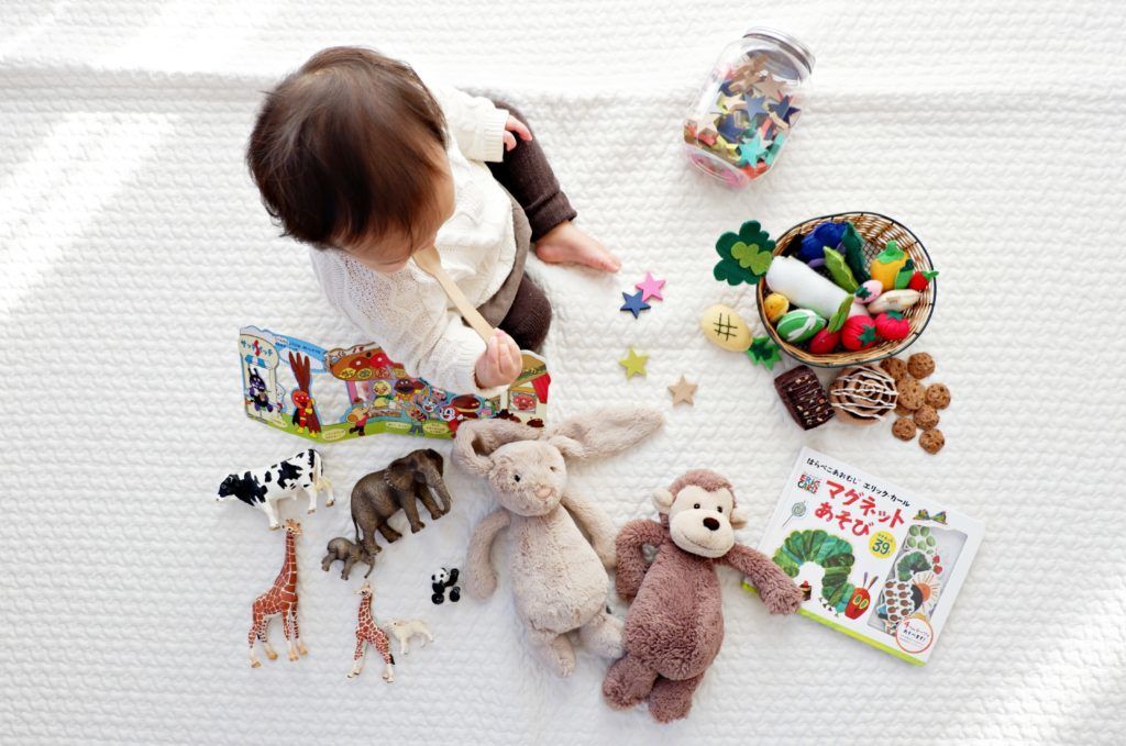 baby playing in conservatory playroom