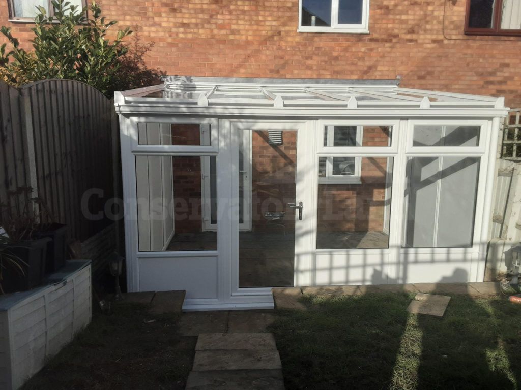 white lean to conservatory