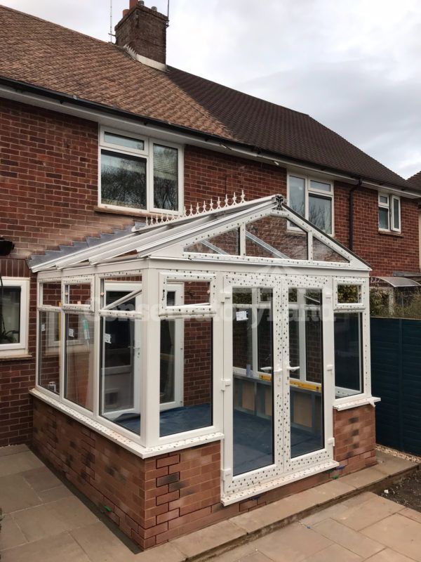 Gable front with self cleaning, solar control glazing, high vaulted roof