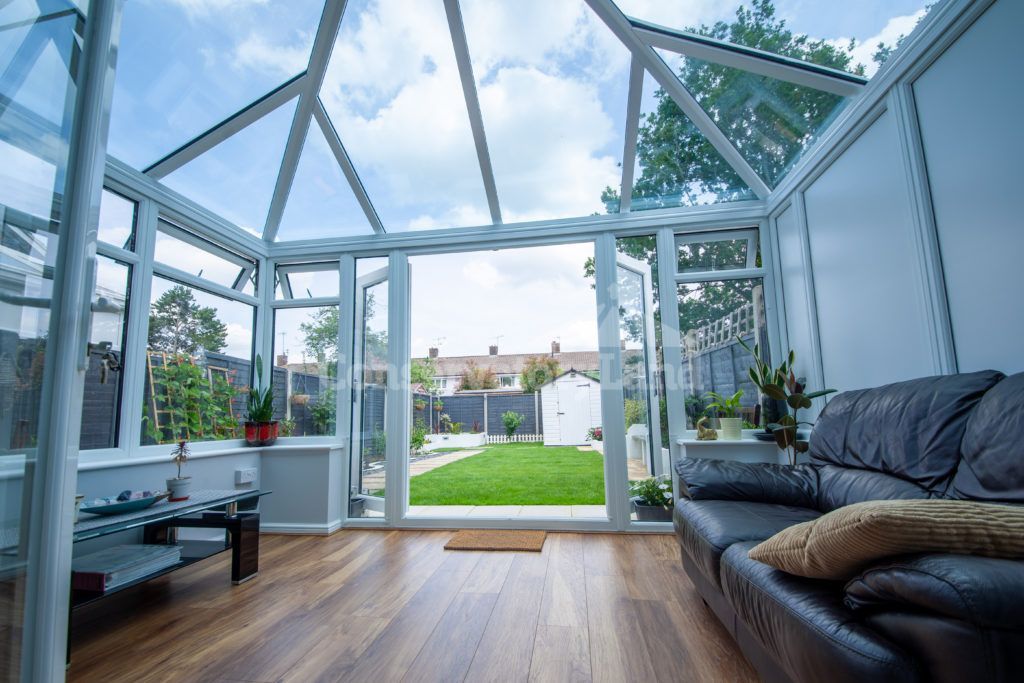 interior view of edwardian conservatory with white uPVC frames