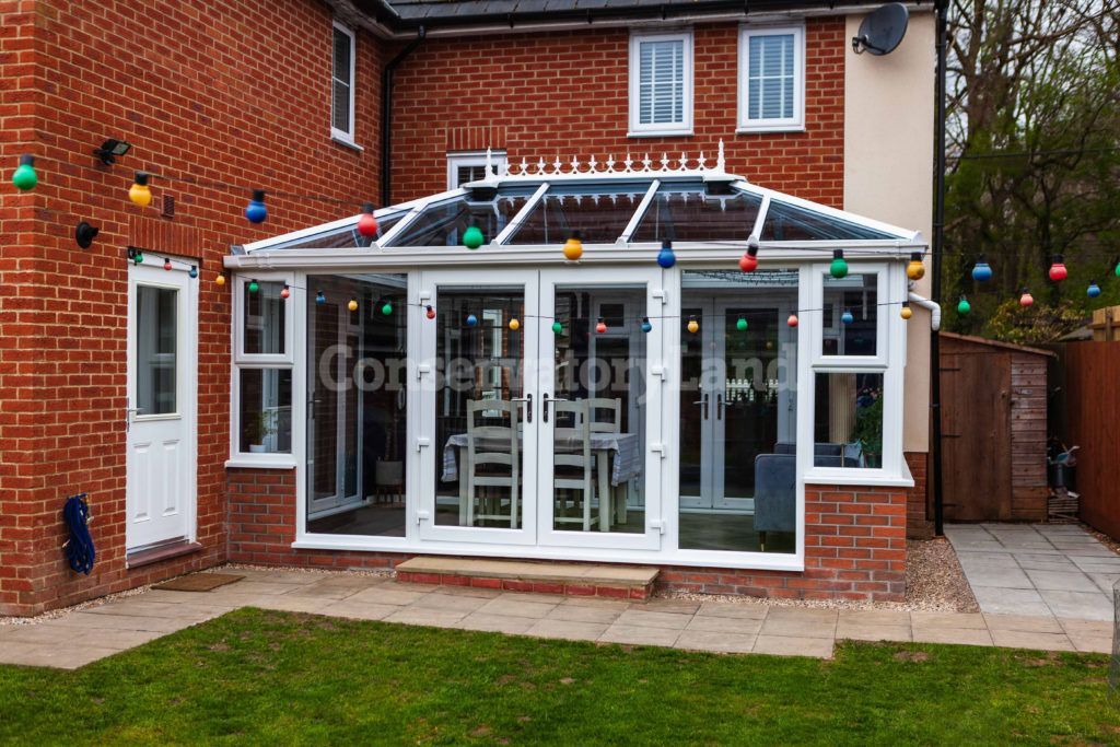 hipped back edwardian with white pvcu frames, solar control galss