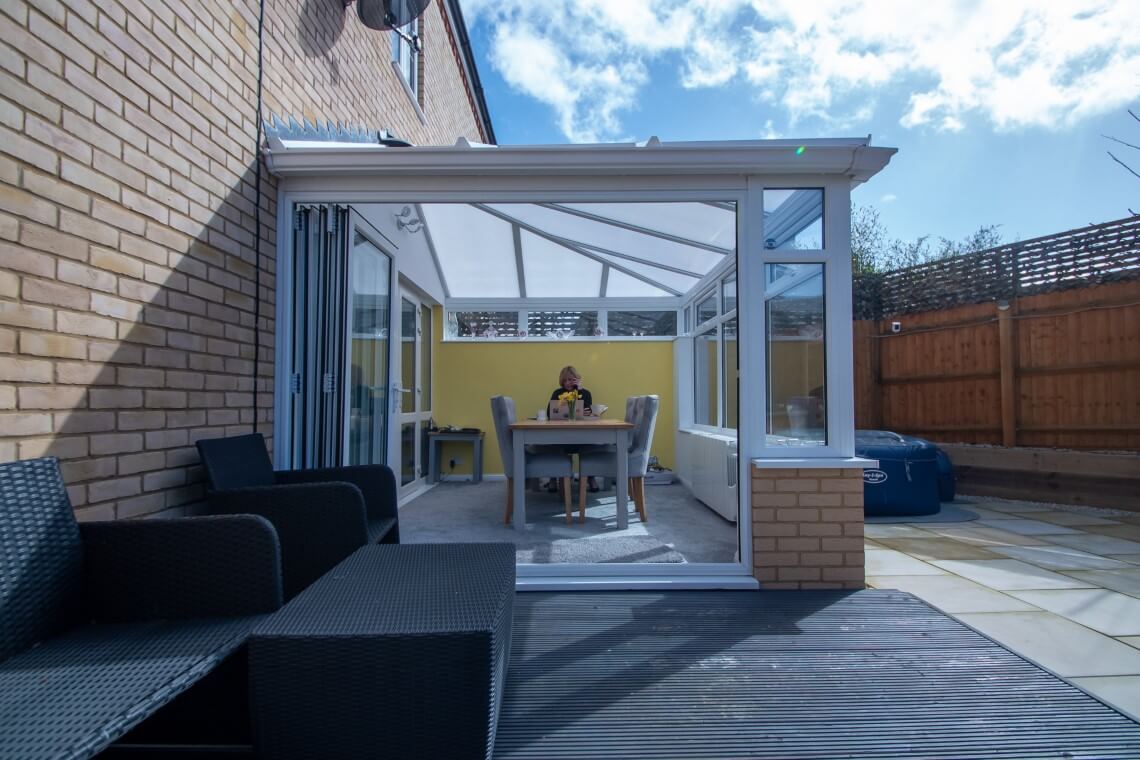 hipped lean-to conservatory with polycarbonate roof