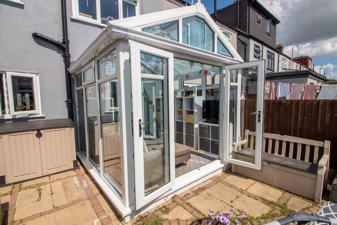 gable conservatory with open french doors